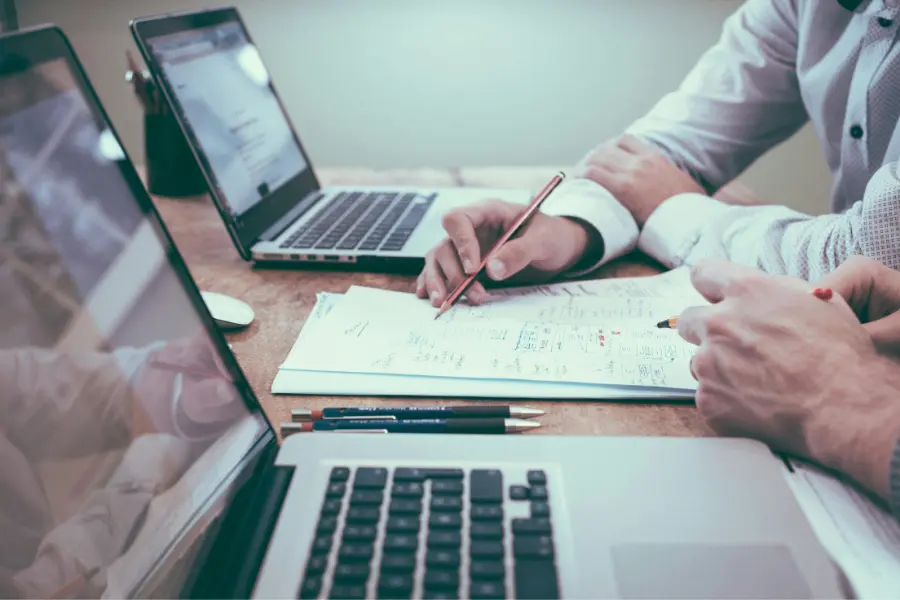 Small business owner getting help from professional bookkeeper